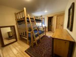 Bedroom three with bunk bed, twin over Queen is also en suite.